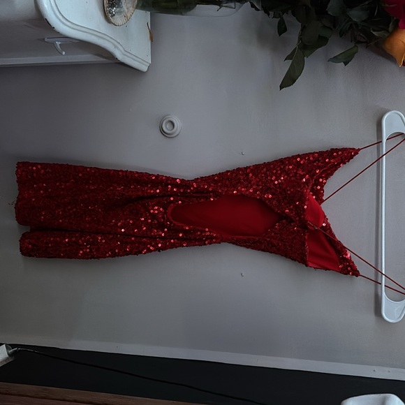 Dillards homecoming dress worn once, size 2 and tailored to fit a 24 inch  waist.